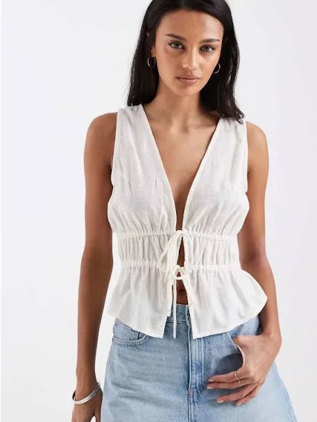 Sleeveless White Tie-Front Peplum Top